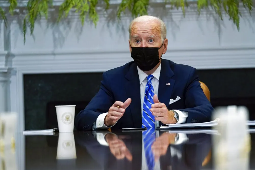 President Joe Biden meets with members of the White House COVID-19 Response Team in the Roosevelt Room of the White House in Washington, Thursday, Dec. 16. 2021. (AP Photo/Susan Walsh)