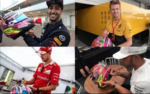 Pilotos de la F1 firman casco de Checo Pérez para subastarlo por México