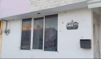 Rafaguean fachada de domicilio en Bosques de Manzanilla