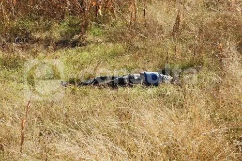 Encuentran a hombre envuelto en una colchoneta en la colonia 13 de Abril