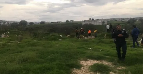 Cuerpo hallado en el Atoyac podría tratarse de una trabajadora de Bimbo