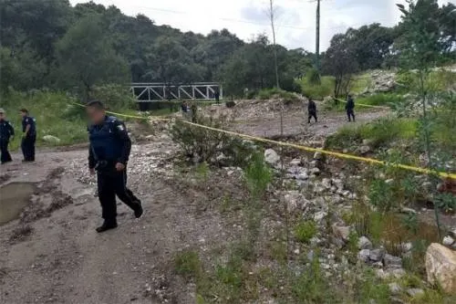 Encuentran dos cuerpos maniatados a un costado del Periférico Ecológico