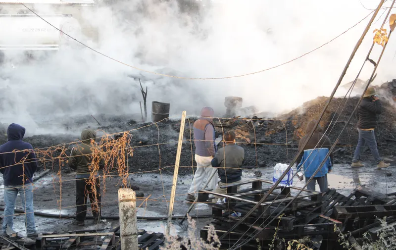Incendio en bodega de tarimas de madera