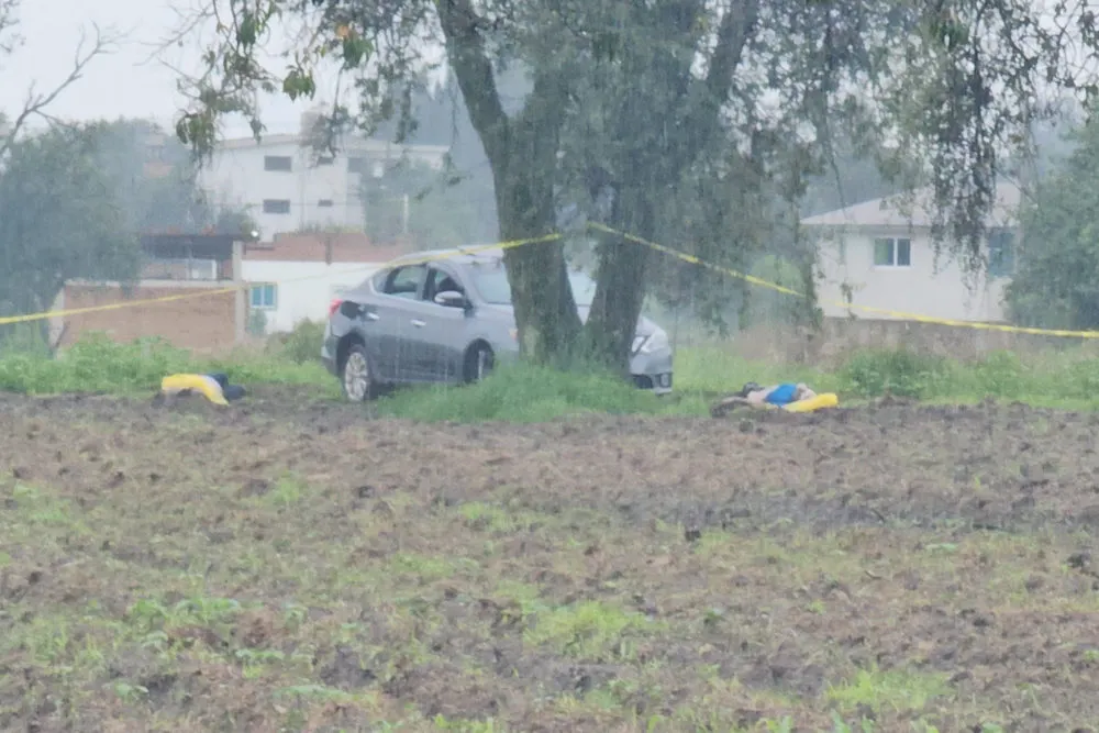 Hallana tres cadáveres en Juan C. Bonilla; las víctimas estaban maniatadas y con signos de violencia