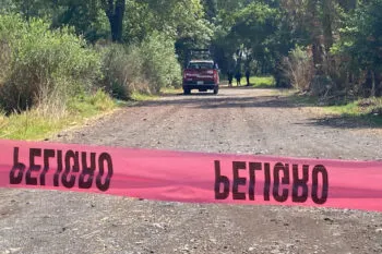 Hallan cadáver atado de pies y manos en Coronango