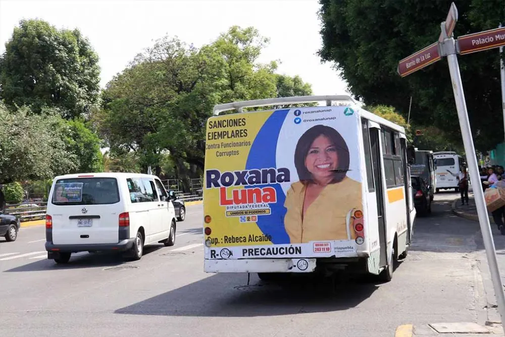 Unidades del transporte público que tengan publicidad política serán detenidas:MBH